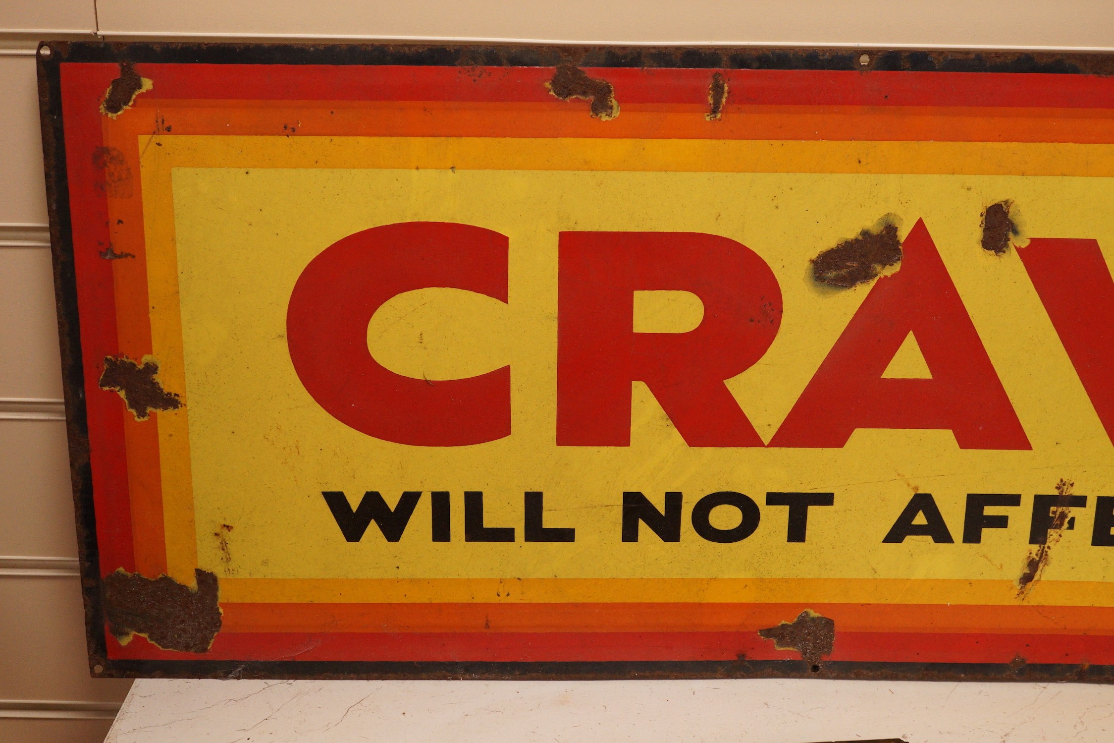 A ‘Craven 'A' will not affect your throat’ enamel advertising sign, 35x123cm